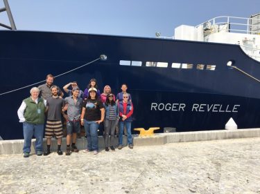 Deborah Kelley (left) and undergraduate students in Newport, Oregon, on Aug. 9 at the end of the first leg of the cruise.