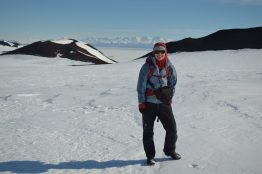 Laura Kehrl on a hike near McMurdo Station while waiting for a flight to the Allan Hills area.