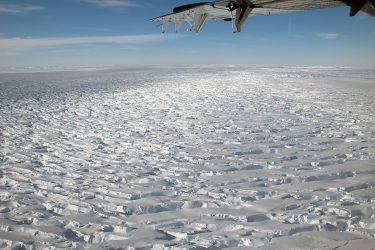 Reconnaissance flight over Thwaites Glacier, which is thought to act as a buttress on the West Antarctic Ice Sheet.