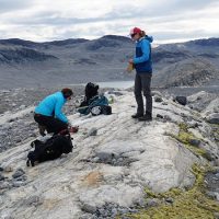 Researchers collect rock samples in Greenland